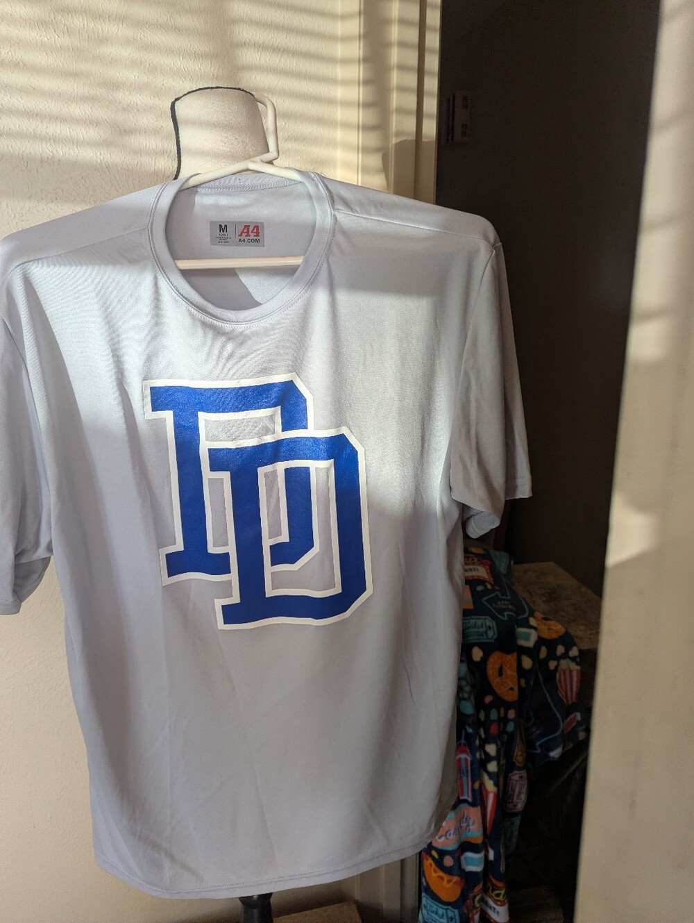 Men's White Performance Tee with Blue DD Logo